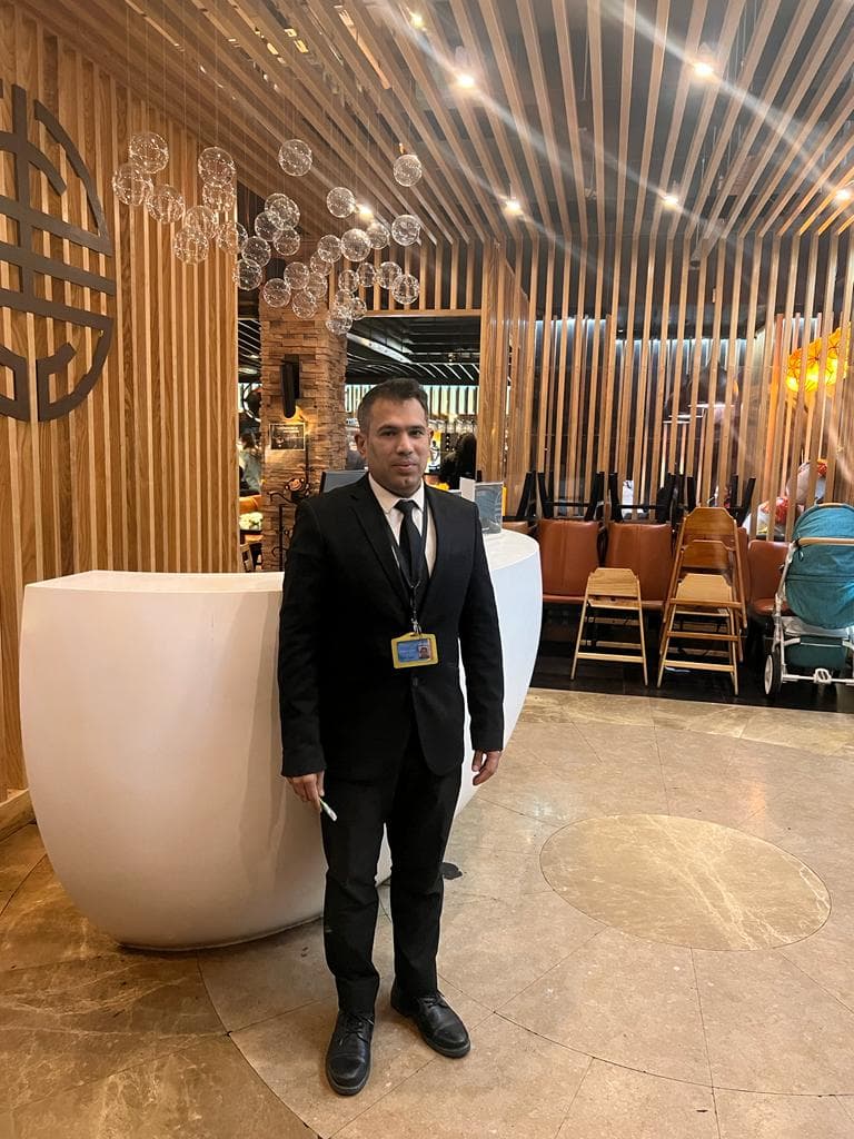 Professional corporate security officer monitoring business facility
