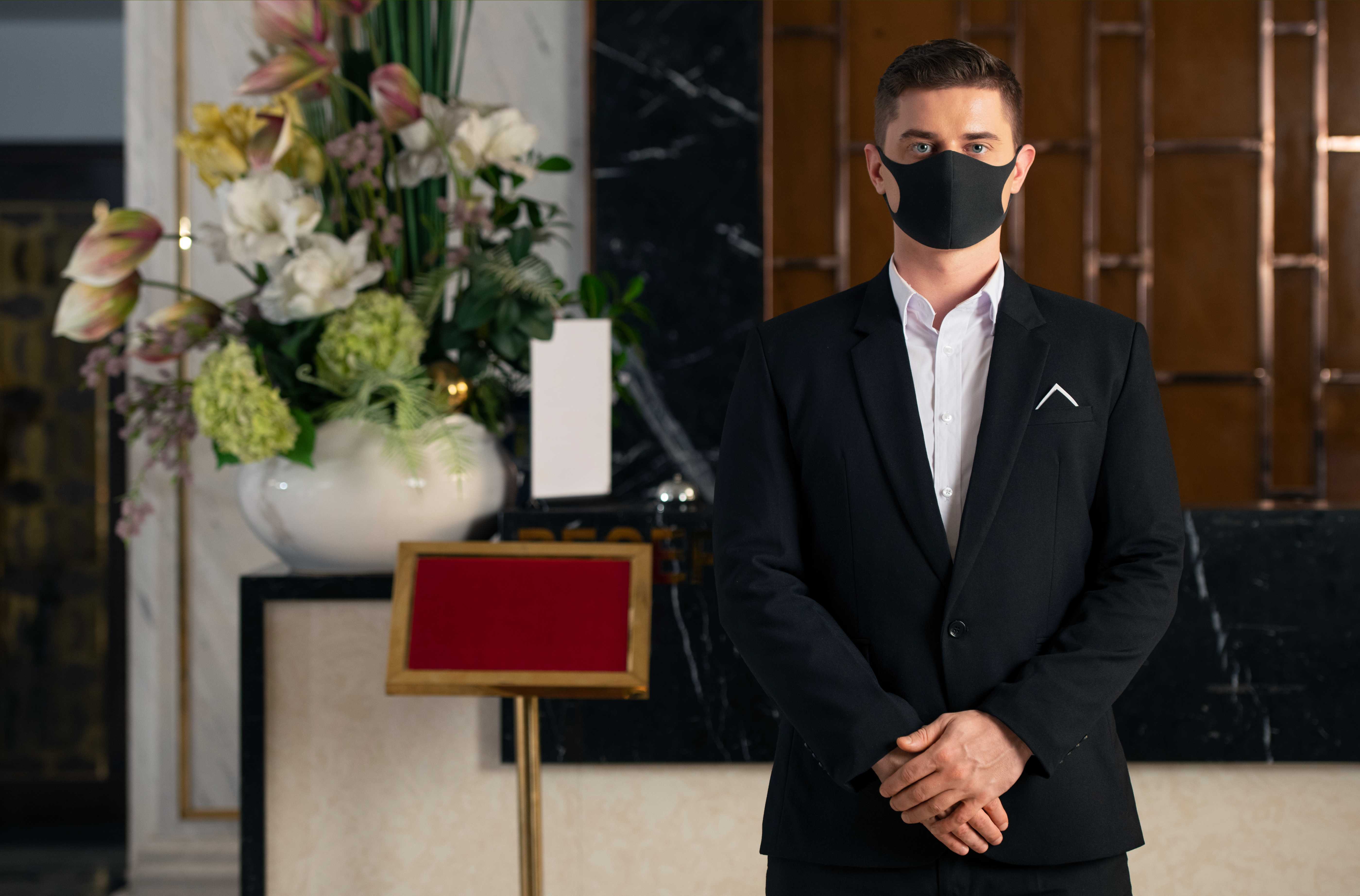 Security officer in a modern hotel lobby